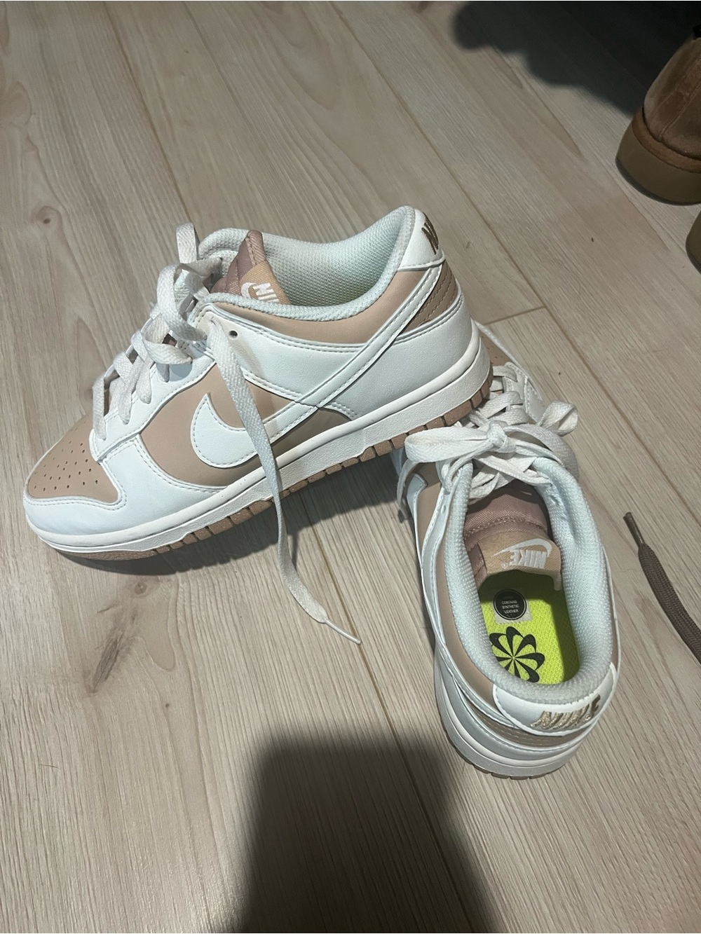 Nike Women’s Low-Top Sneakers in White and Light Tan